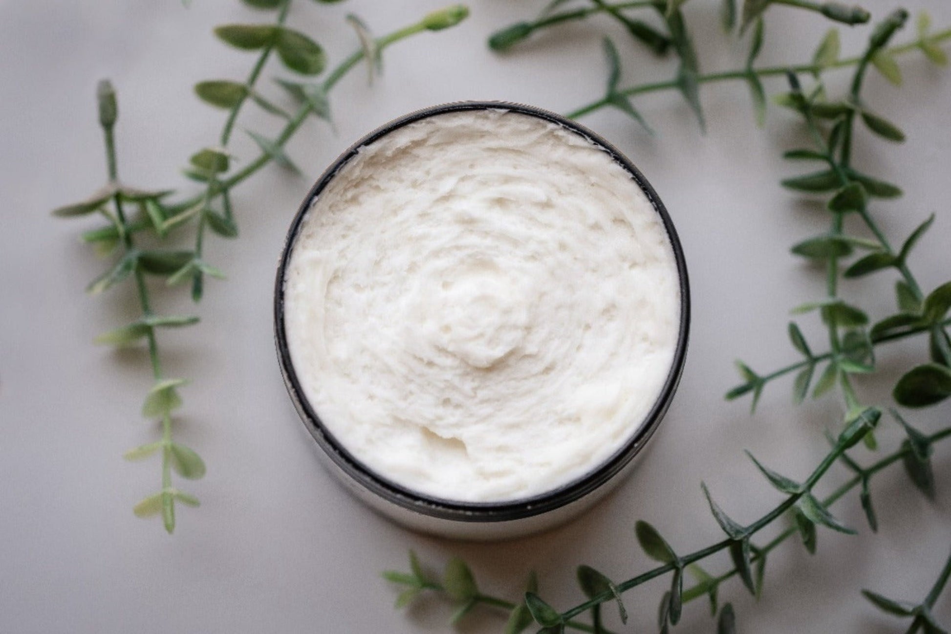 All natural, handmade, unscented whipped body butter with lid off 