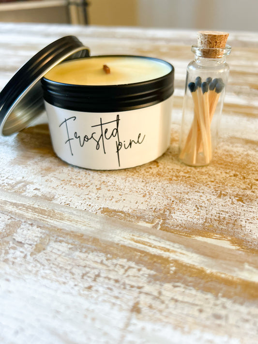 Handpoured, soy wax candle with wood wick scented with fir needle, cedar and tangerine. 