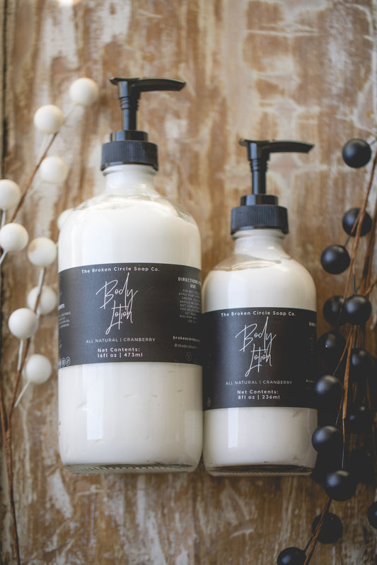 all natural, handmade body lotion scented like cranberry. Both large and small bottle